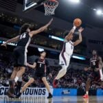 Gonzaga point guard Ryan Nembhard passes